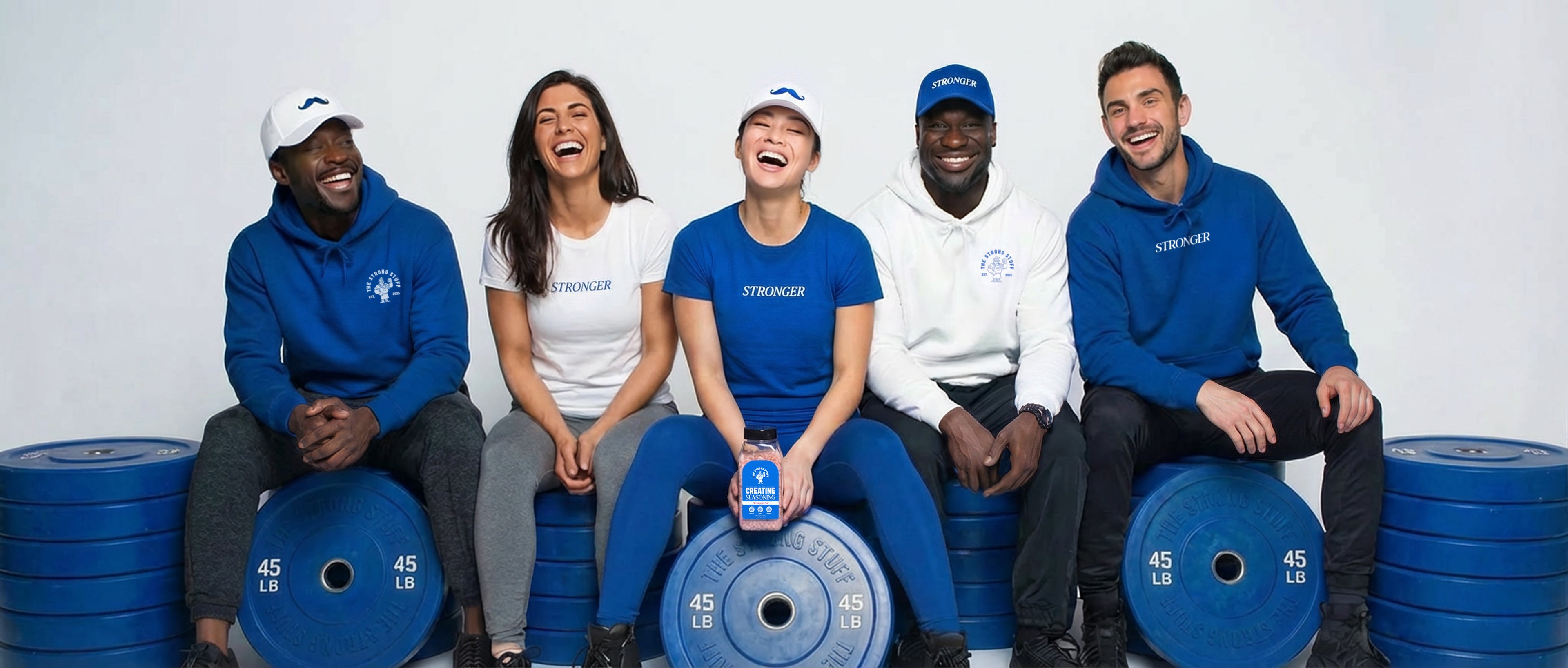 Five people posing with blue weight plates against a white background